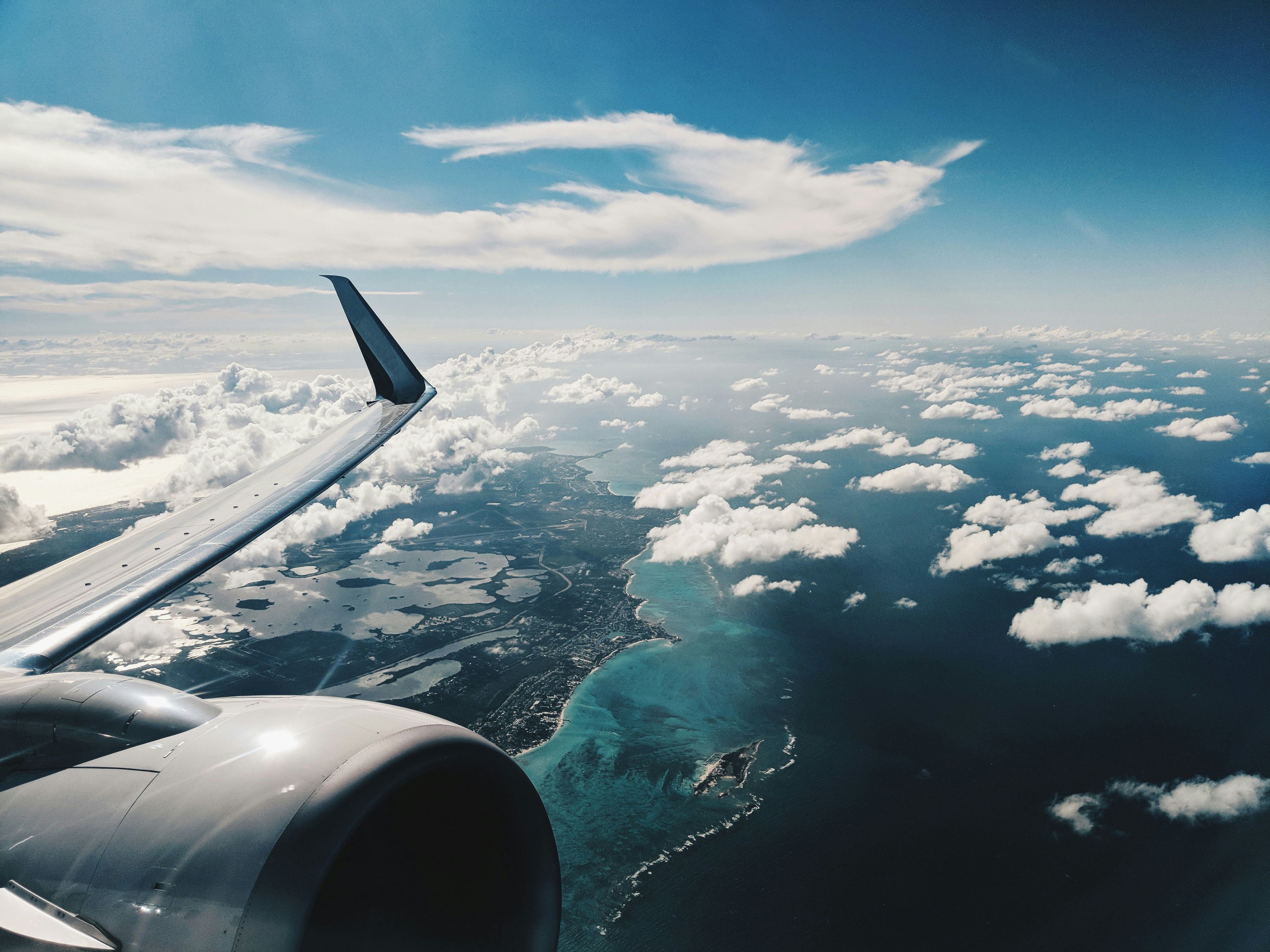 Plane flying over the ocean